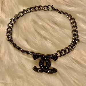 Charcoal gray Chanel Upcycled studded charm added to a link chain bracelet 🖤🖤